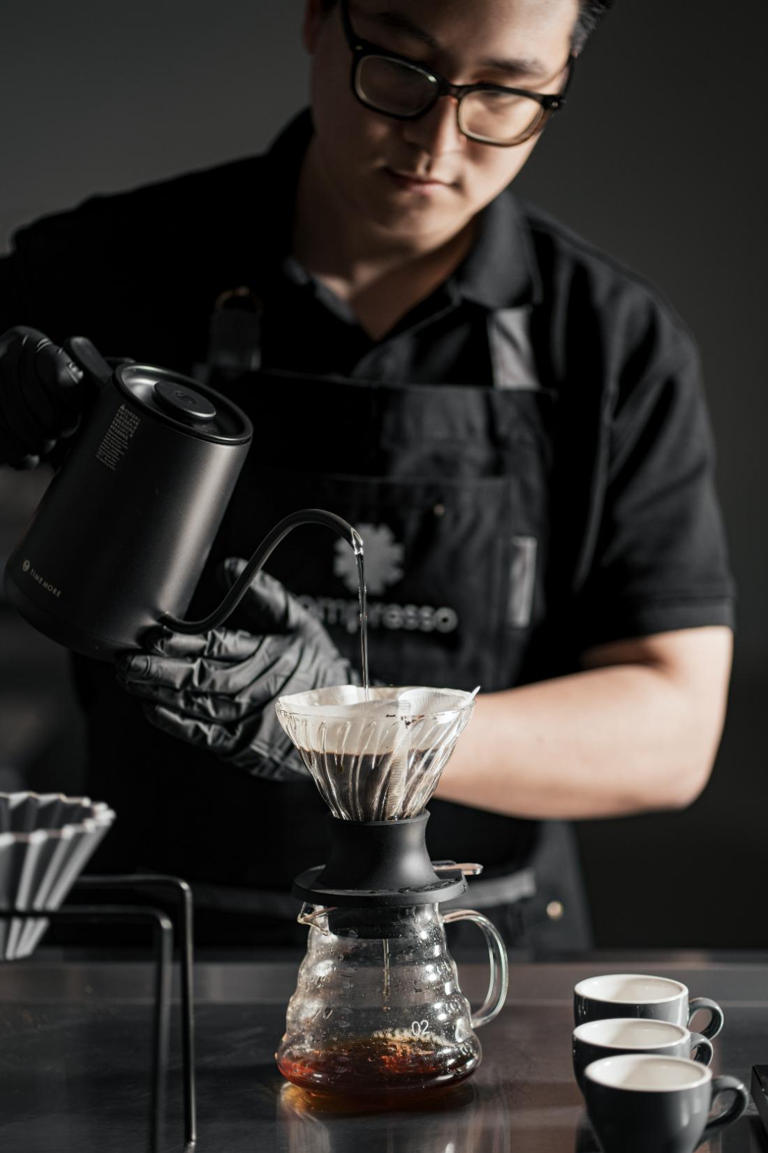 Barista pouring V60